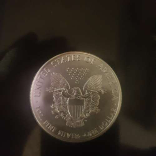 1 oz  2014 American Silver Eagle , Pure solid Silver Bullion ( 999.9%)