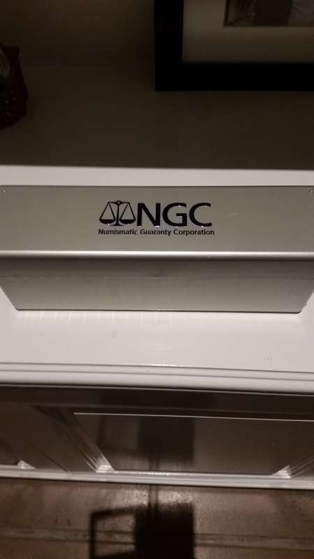 NGC slab with 20 mandela birthday 2008 ms66 coins