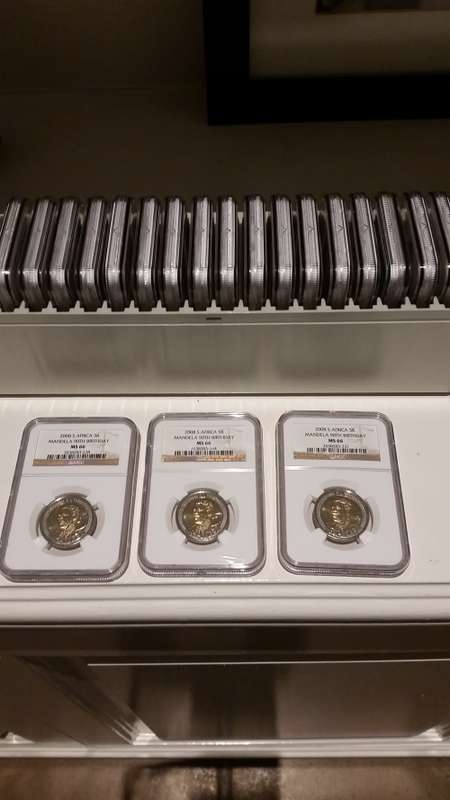 NGC slab with 20 mandela birthday 2008 ms66 coins