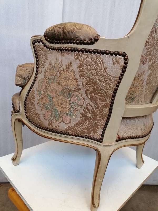 A  French Pair of Painted Louis XV style and Gold leafed Bergere Chairs
