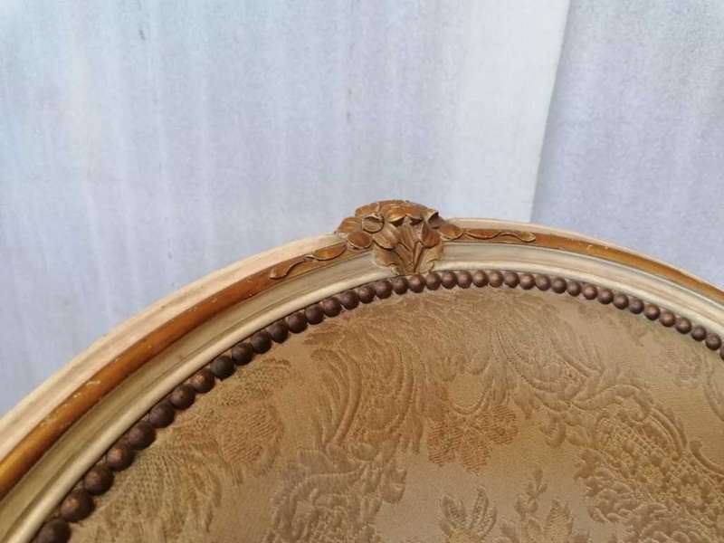 A  French Pair of Painted Louis XV style and Gold leafed Bergere Chairs