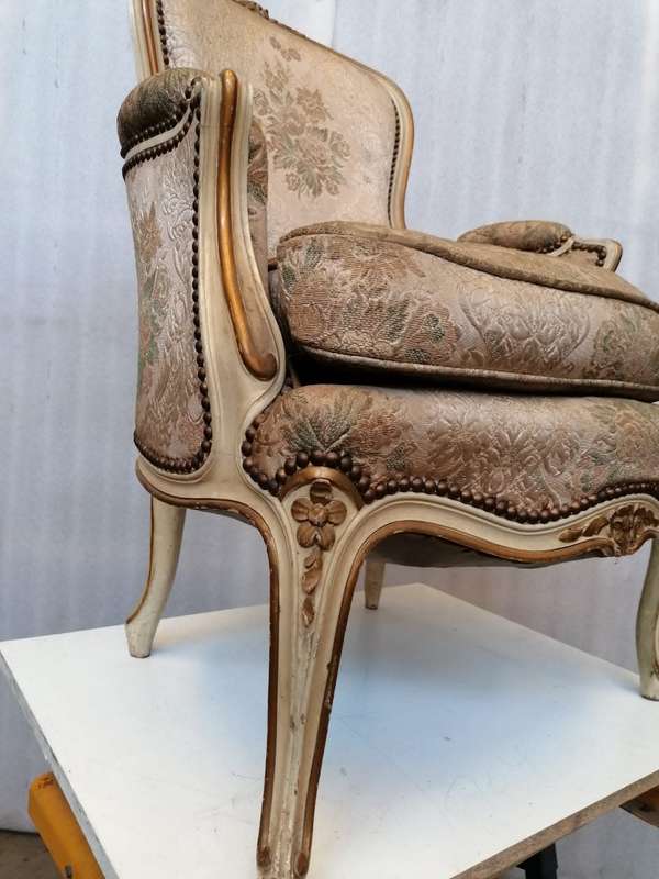 A  French Pair of Painted Louis XV style and Gold leafed Bergere Chairs