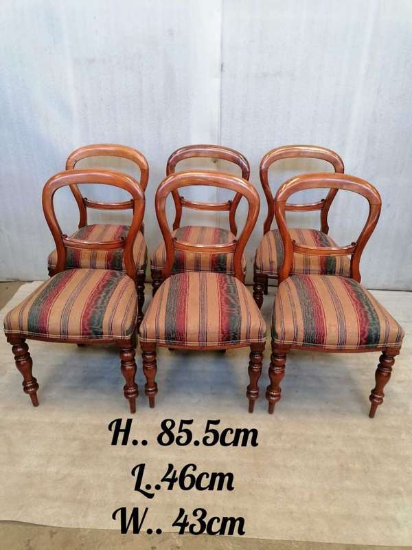 A set of 6 Mahogany Balloon back chairs