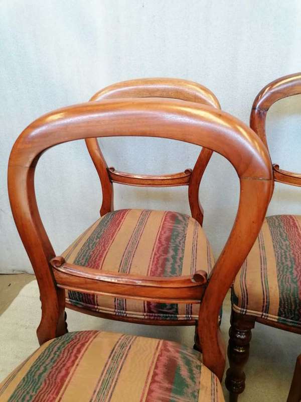 A set of 6 Mahogany Balloon back chairs
