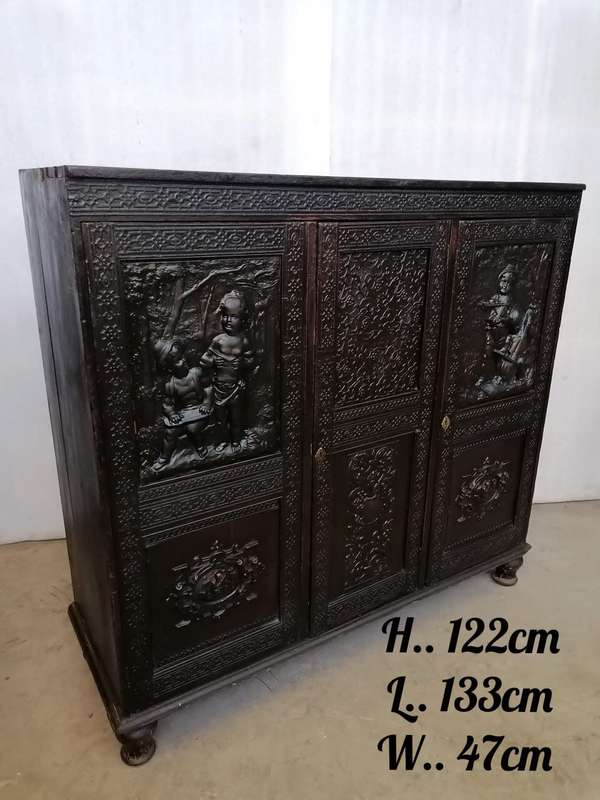 A 19th century German cabiet with beautiful Repoussè leather doors