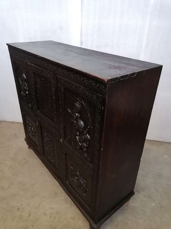 A 19th century German cabiet with beautiful Repoussè leather doors
