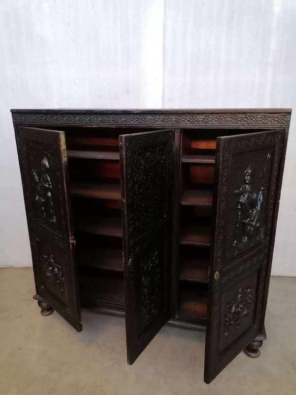 A 19th century German cabiet with beautiful Repoussè leather doors