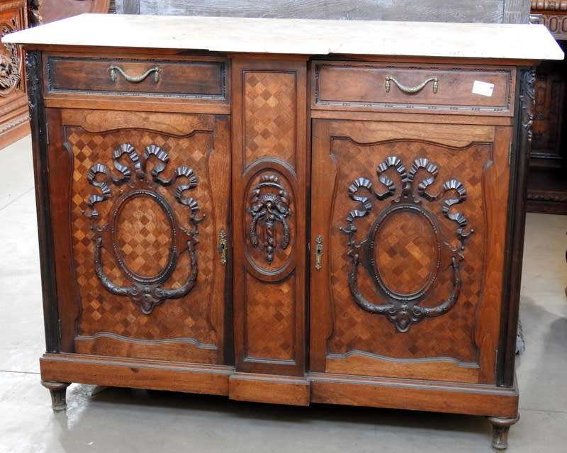 A pair of Louis XVI style cabinets with parquetry inlay and Marble tops.