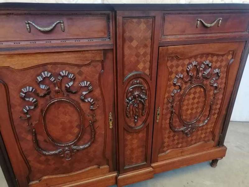 A pair of Louis XVI style cabinets with parquetry inlay and Marble tops.