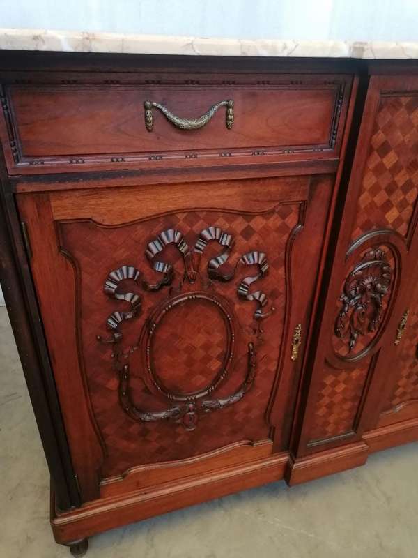 A pair of Louis XVI style cabinets with parquetry inlay and Marble tops.