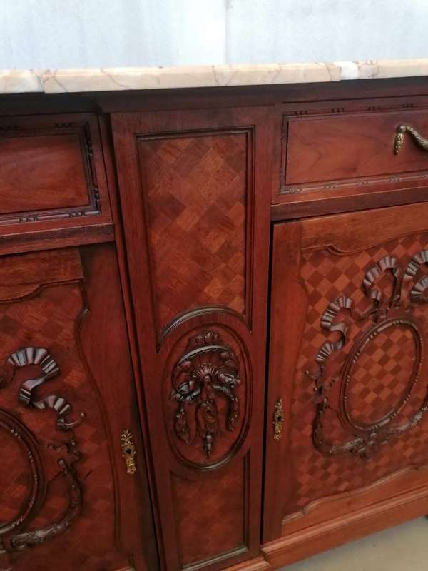 A pair of Louis XVI style cabinets with parquetry inlay and Marble tops.