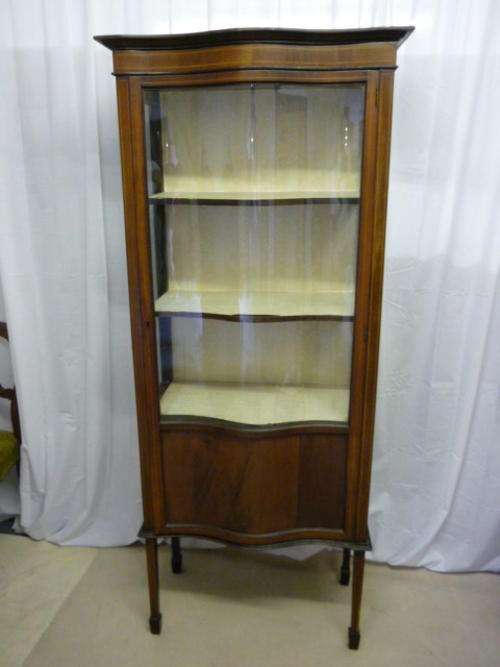 Mahogany bowfronted display cabinet