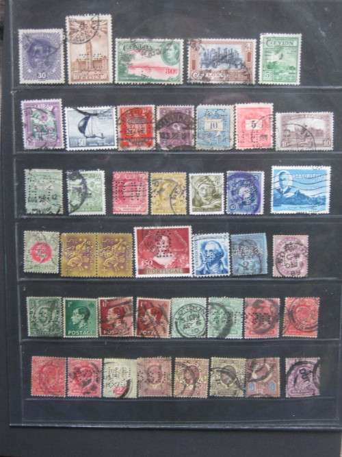 120 MIXED WORLD PERFINS - BID PER STAMP