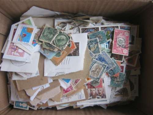 BOX OF STAMPS ON PAPER - MIXED WORLD BUT MOSTLY UNION/RSA