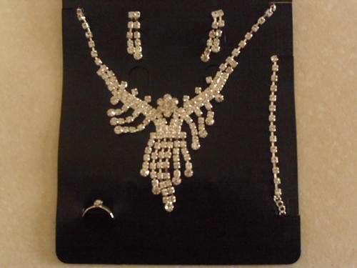 5 PIECE SILVER WITH SIM DIAMONDS NECKLACE WITH MATCHING EARRINGS,RING AND BRACELET