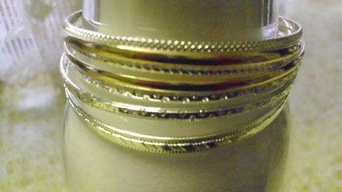 7 PIECE GOLD AND SILVER COATED BRACELET