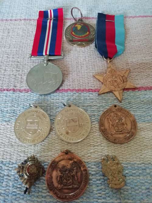 BIG LOT OF MEDALS AND INSIGNIA 2XFULL MEDALS ISSUED TO JJ BEKKER