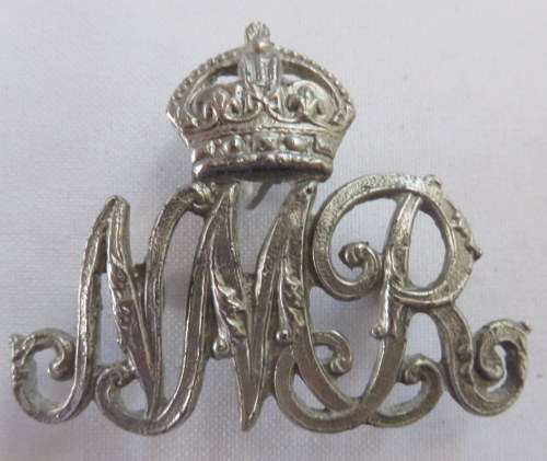 NATAL MOUNTED RIFLES LEAD CAST HELMET BADGE-WORN 1927-43- 3 LUGS