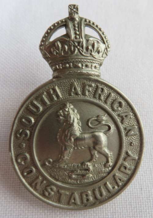 SA CONSTABULARY ,WHITE METAL HELMET & CAP BADGE-SOLID CENTRE-2 LUGS