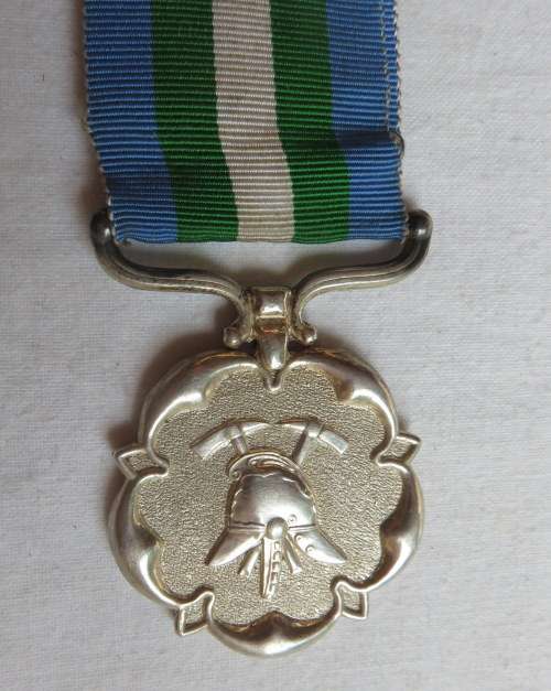 FULL SIZE RHODESIA FIRE BRIGADE MEDAL NAMED TO:FIREMAN V.H. ZERF(RETD)