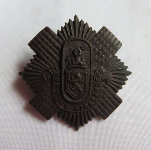 CAPE TOWN HIGHLANDERS,BRONZE GLENGARRY BADGE-WORN 1940-1943- 2 LUGS