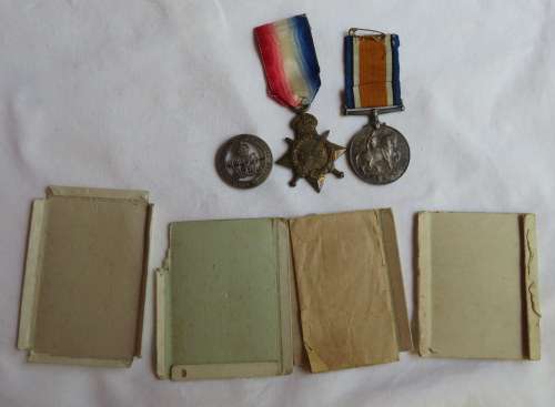MEDAL PAIR NAMED TO PTE. A.W. GATES-1ST & 7TH SA INFANTRY WITH WOUND BADGE-WOUNDED & CONFIRMED ON RO