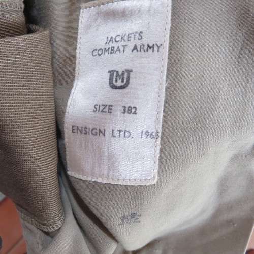 ORIGINAL MILITARY ISSUE BUNNY JACKET WITH MILITARY AND PURE WOOL LABELS-SIZE MEDIUM-MEASURES 50CM AR