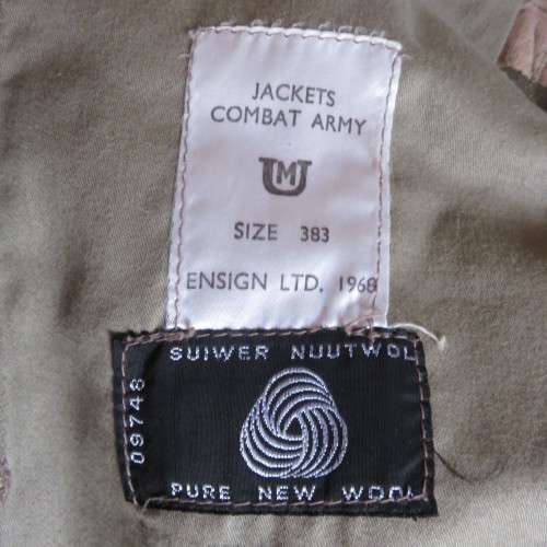 ORIGINAL MILITARY ISSUE BUNNY JACKET WITH MILITARY AND PURE WOOL LABELS-SIZE  MEDIUM-MEASURES 55CM A