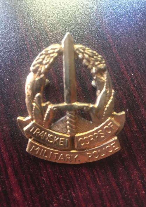 TRANSKEI MILITARY POLICE CAP BADGE- 2X SCREW LUGS