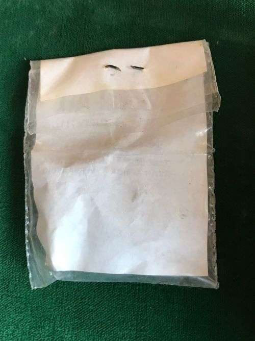 SA CHROMED  BUGLER BADGE IN ORIGINAL PACKAGING - 2 PINS