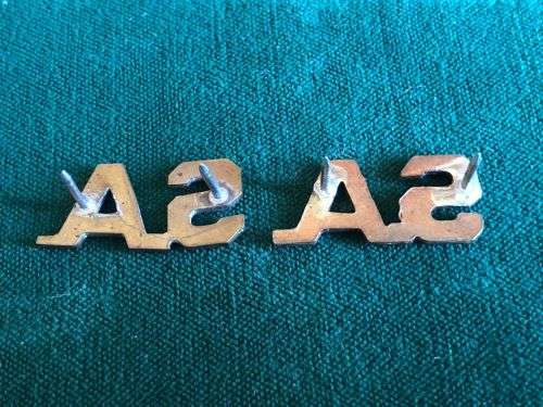 SA BRASS COLLAR TITLES-SOLD IN PAIRS- PINS INTACT