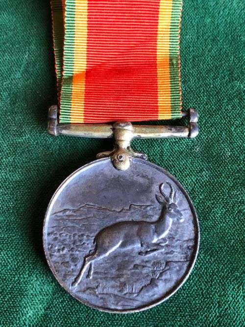 WW2 SINGLE AFRICA SERVICE MEDAL (SILVER) AWARDED TO  W 297804 C.E. COLLINS