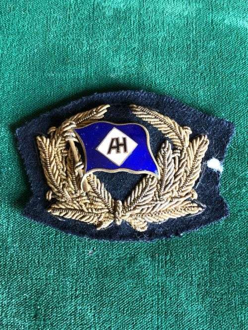 UNIDENTIFIED BULLION WIRE-EMBROIDERED NAVAL CAP BADGE