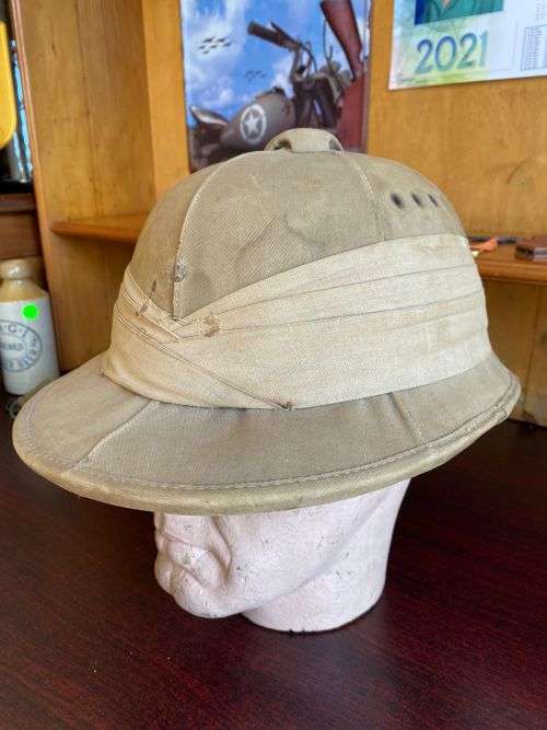 SA MADE WW2 PITH HELMET STAMPED AND DATED-THE PAPER INSIDE THE LEATHER LINER IS JUST TO PROTECT THE