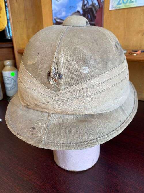 SA MADE WW2 PITH HELMET STAMPED AND DATED-THE PAPER INSIDE THE LEATHER LINER IS JUST TO PROTECT THE