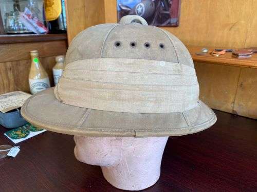SA MADE WW2 PITH HELMET STAMPED AND DATED-THE PAPER INSIDE THE LEATHER LINER IS JUST TO PROTECT THE