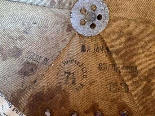 SA MADE WW2 PITH HELMET STAMPED AND DATED-THE PAPER INSIDE THE LEATHER LINER IS JUST TO PROTECT THE