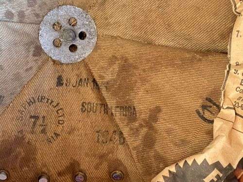 SA MADE WW2 PITH HELMET STAMPED AND DATED-THE PAPER INSIDE THE LEATHER LINER IS JUST TO PROTECT THE