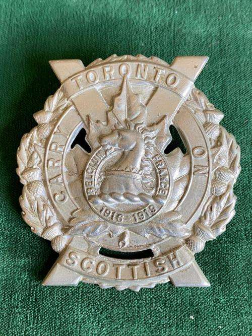 TORONTO SCOTTISH REGIMENT,WHITE METAL CAP BADGE-FOUNDED 1920- 2 LUGS