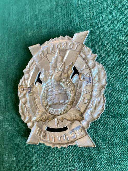 TORONTO SCOTTISH REGIMENT,WHITE METAL CAP BADGE-FOUNDED 1920- 2 LUGS