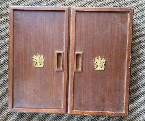 RHODESIAN BADGES OF THE REGIMENTS AND CORPS OF THE FORMER ARMY,PRESENTED IN A CUSTOM MADE CABINET OF
