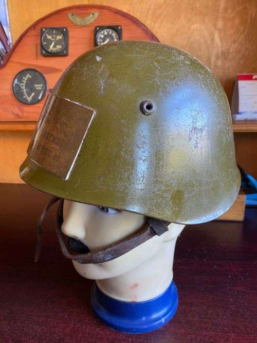 BULGARIAN M72 STEEL HELMET-USED IN ANGOLA DURING THE BORDER WAR-THERE IS A PLATE STUCK TO THE FRONT
