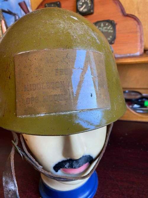 BULGARIAN M72 STEEL HELMET-USED IN ANGOLA DURING THE BORDER WAR-THERE IS A PLATE STUCK TO THE FRONT
