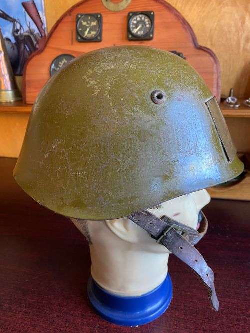 BULGARIAN M72 STEEL HELMET-USED IN ANGOLA DURING THE BORDER WAR-THERE IS A PLATE STUCK TO THE FRONT