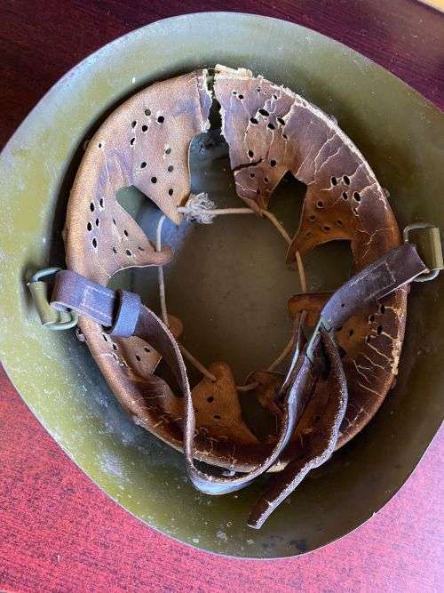 BULGARIAN M72 STEEL HELMET-USED IN ANGOLA DURING THE BORDER WAR-THERE IS A PLATE STUCK TO THE FRONT