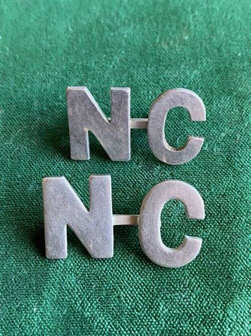 NATAL CARBINEERS WHITE METAL TITLE PAIR -1899-1902-ONE LUG MISSING