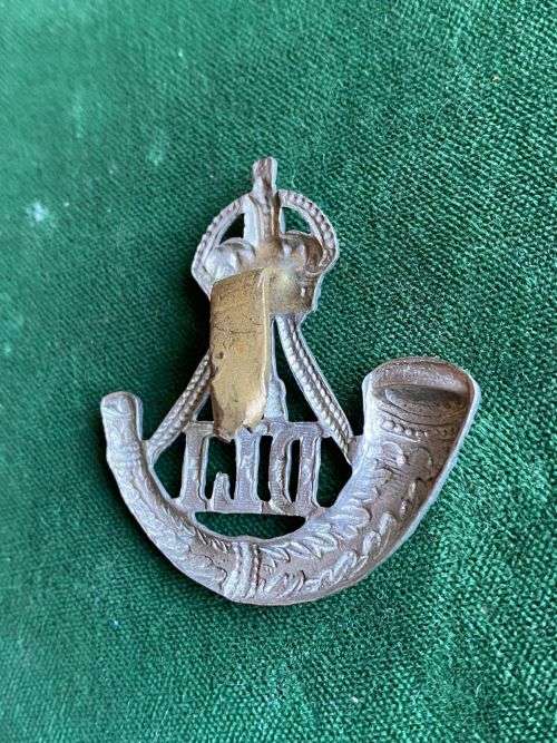 DURBAN LIGHT INFANTRY WHITE METAL CAP BADGE-1902-1919-SLIDER HALF