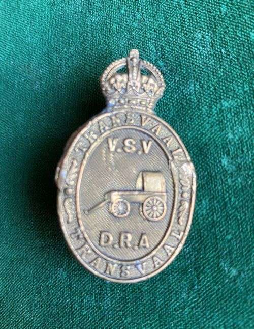 DEFENCE RIFLE ASSOCIATION CAP BADGE-TRANSVAAL 1923-1943- 2 LUGS