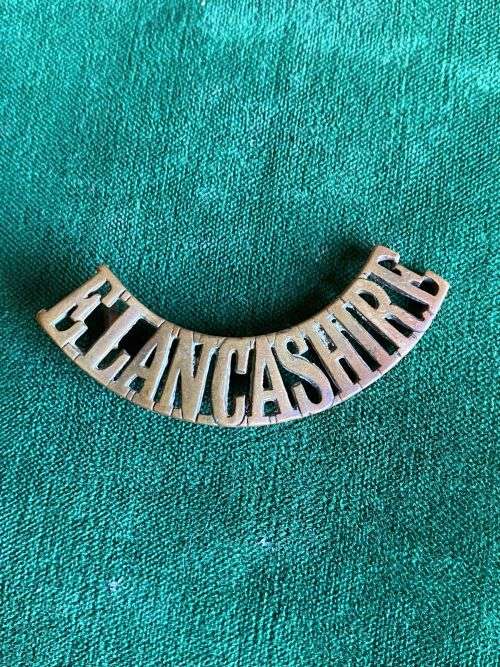 EAST LANCS REGT. BRASS TITLE -ONE LUG