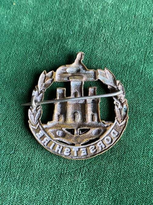 DORSETSHIRE REGIMENT CAP BADGE-WORN 1900-1951